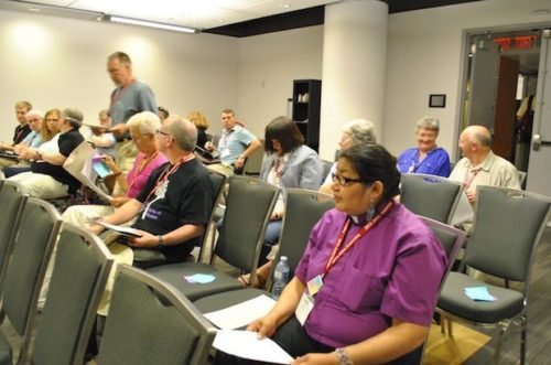 The newly-elected members of the Council of General Synod met briefly during the 2013 General Synod meeting in Ottawa. Photo: Art Babych
