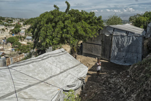 A child stands inside the Carra Deux Camp for Internally Displaced Persons (IDPs) in Port-au-Prince, Haiti. Photo: Logan Abassi/United Nations