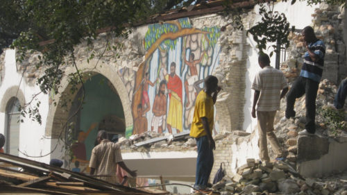 Casera Bazile’s Baptism of Our Lord mural, which he painted inside the Episcopal Diocese of Haiti’s Holy Trinity Cathedral in Port-au-Prince, in 1951 was one of three of the original 14 murals which, in part, survived the Jan. 12, 2010, earthquake that leveled the cathedral. Photo: Dave Drachlis/Diocese of Alabama