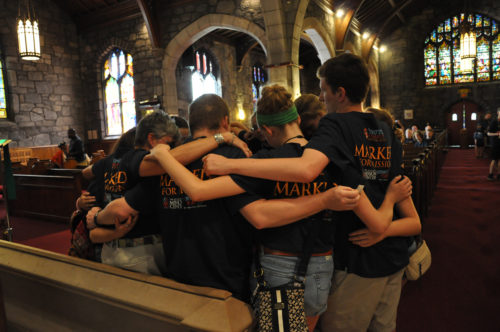 A group of Episcopal Youth Event 2014 participants from Massachusetts take a moment to pray July 11 inside the African Episcopal Church of St. Thomas. The group visited the historic church during the day’s pilgrimage around the Philadelphia area to visit historic sites and places of Episcopal Church mission work. Photo: Mary Frances Schjonberg/Episcopal News Service