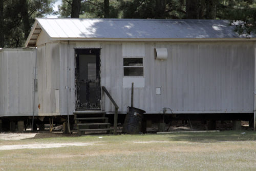Farmworkers live in trailers like this set back off rural, county roads. Photo: Lynette Wilson/ENS 