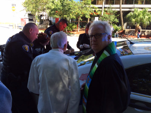 the Rev. Canon Mark H. Sims, rector of St. Mary Magdalene Episcopal Church in Coral Springs, is issued with a criminal citation for feeding the homeless.