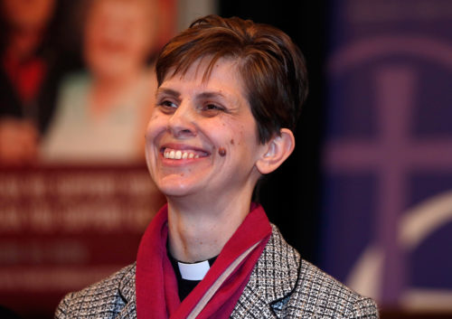 Libby Lane, a suffragan bishop in the Diocese of Chester, smiles as her forthcoming appointment as the new bishop of Stockport is announced in the Town Hall in Stockport, northern England, Dec. 17, 2014. Lane will become the Church of England's first female bishop. Photo: REUTERS/Phil Noble