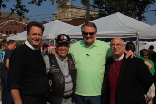 From left, the Rev. Chip Graves, rector of Trinity Episcopal Church; Larry Clark, a member of Trinity’s vestry and a longtime supporter of River Cities ministries; Huntington Mayor Steve Williams; and the Rt. Rev. W. Michie Klusmeyer, bishop of West Virginia. Photo: Missy Browning 