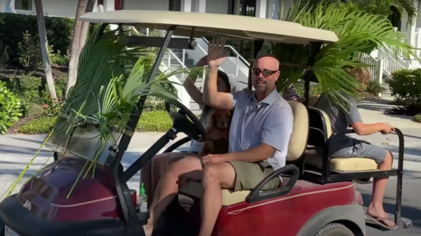Golf cart palm procession