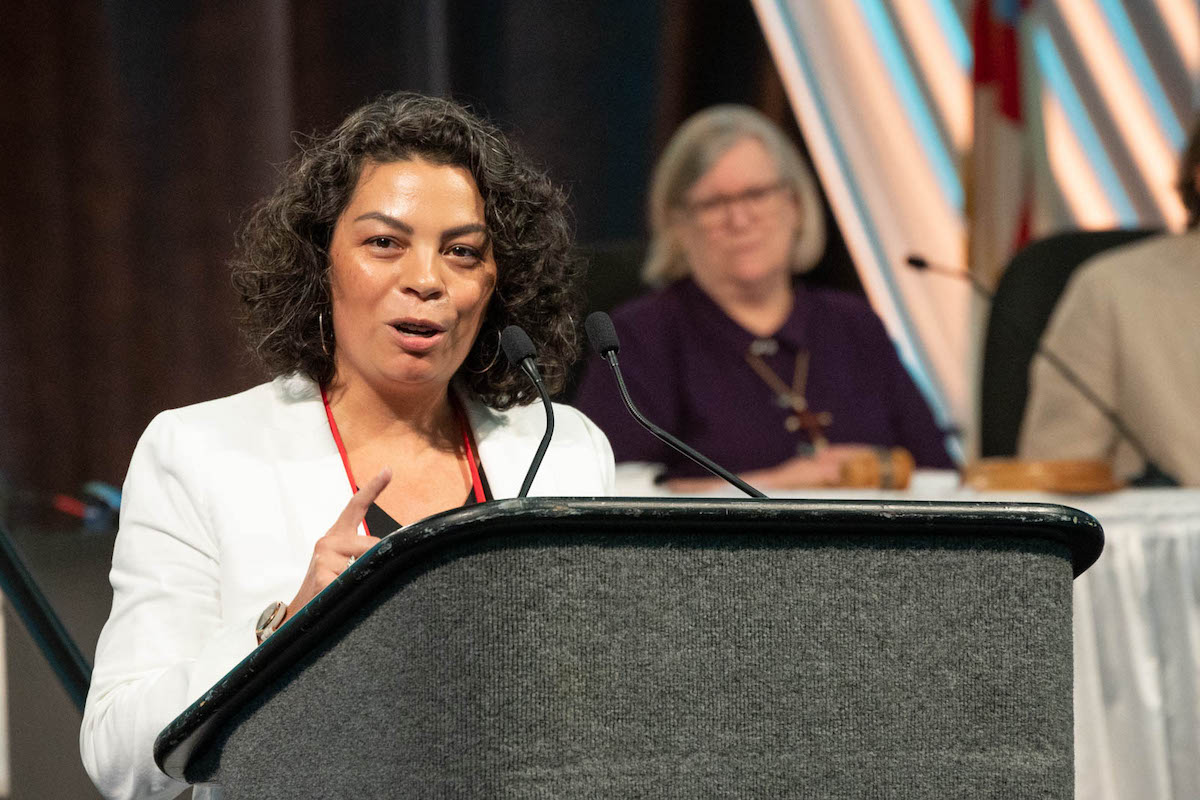 Julia Ayala Harris addresses the House of Deputies after her election at the 80th General Convention in Baltimore, Maryland, as the Rev. Gay Clark Jennings, the outgoing president, listens. Photo: Scott Gunn